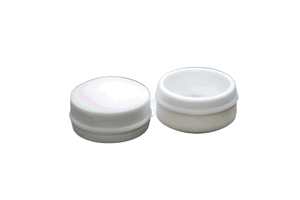 Angled front-top view of the cover sections of two white LDPE injection moulded secure nut and bolt cover caps.